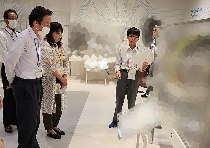 The students provide explanations as museum directors