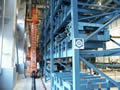 Automated warehouse/retrieval system for molds for a 40,000-ton press machine
